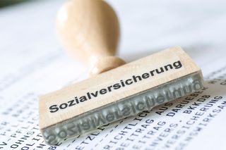 Foto: Holzstempel Sozialversicherung